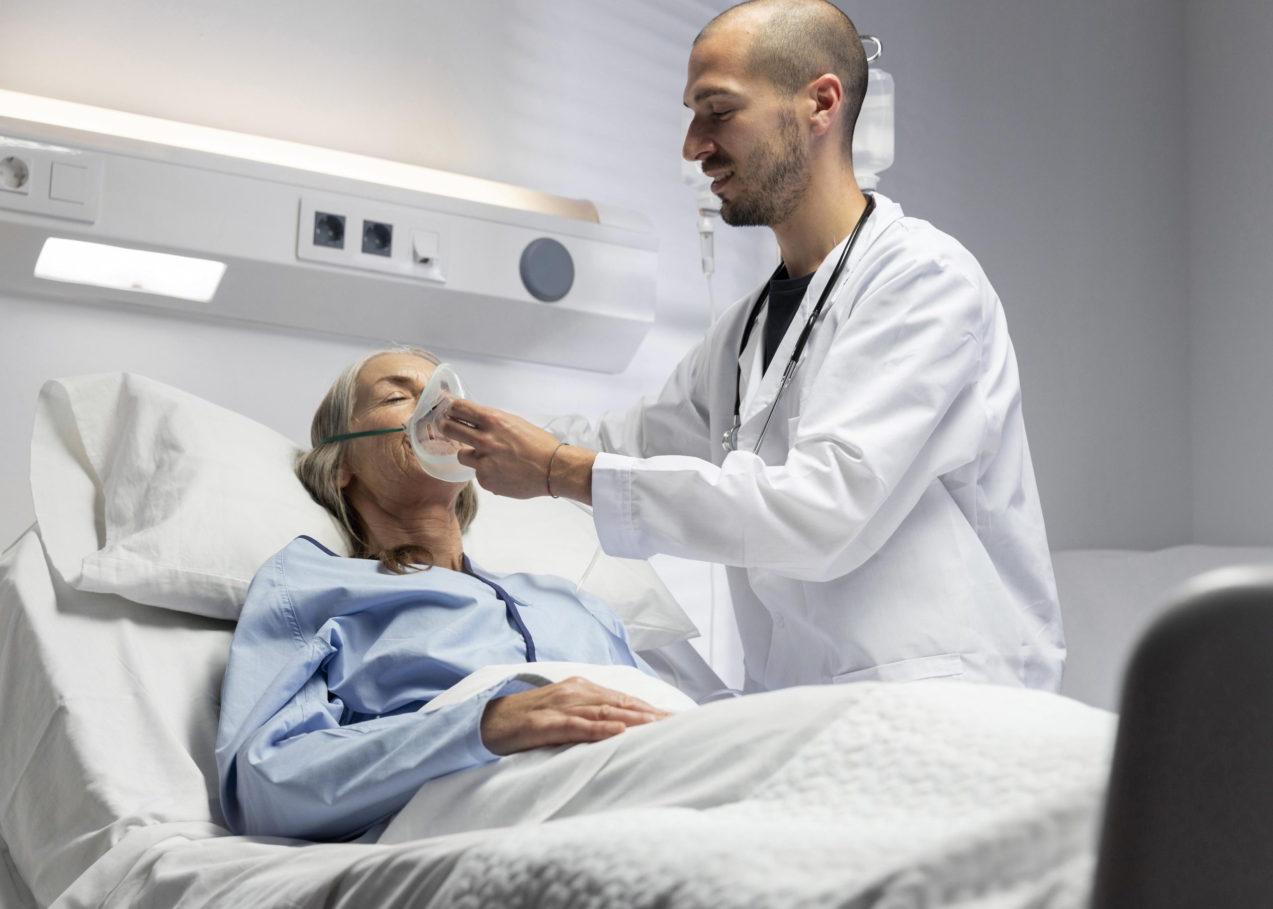 doctor putting oxygen mask medium shot scaled